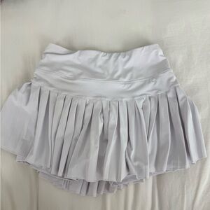 Gold hinge white skirt